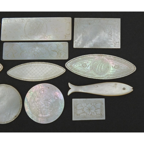 566 - Eleven Chinese Canton mother of pearl gaming counters and one other, the largest 6.5cm wide