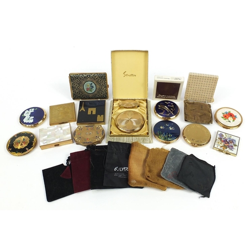 478 - Twelve vintage ladies powder compacts and a tooled leather cigarette case, some enamelled including ... 