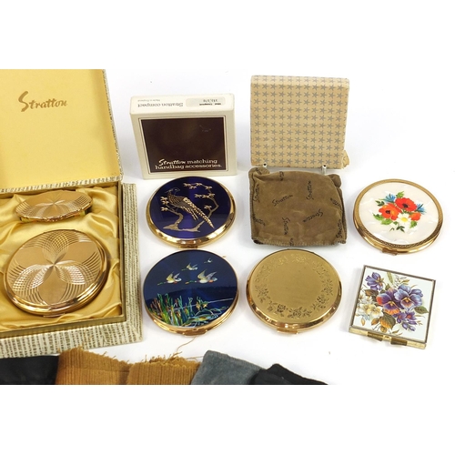 478 - Twelve vintage ladies powder compacts and a tooled leather cigarette case, some enamelled including ... 