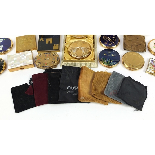 478 - Twelve vintage ladies powder compacts and a tooled leather cigarette case, some enamelled including ... 