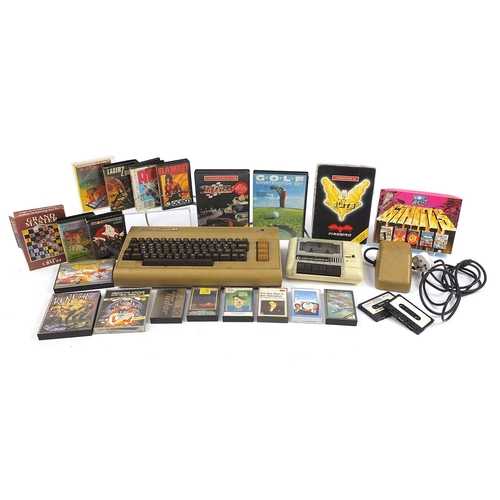 1185 - Vintage Commodore 64 console with a collection of games