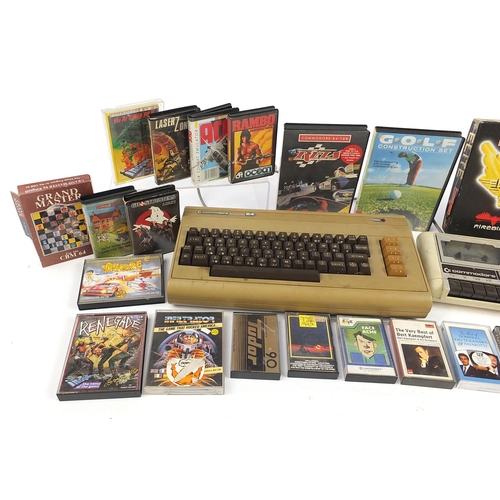 1185 - Vintage Commodore 64 console with a collection of games