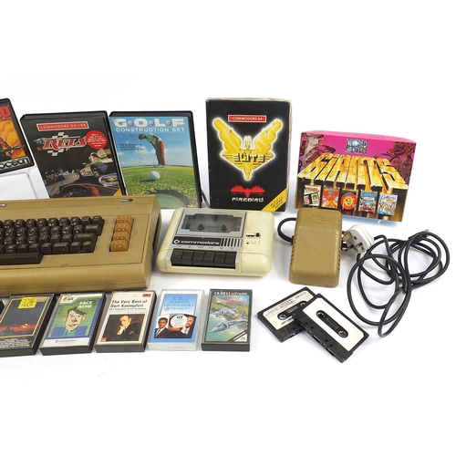 1185 - Vintage Commodore 64 console with a collection of games