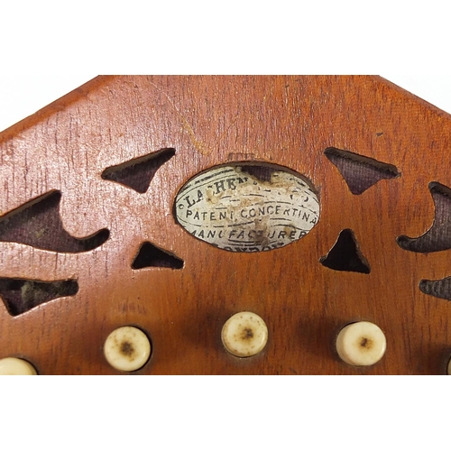 530 - Lachenal & Co, 19th century mahogany 22 button concertina, numbered 86802, 18cm in diameter