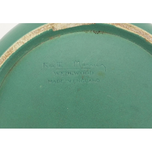 214 - Keith Murray for Wedgwood, green glazed footed bowl, 26cm in diameter