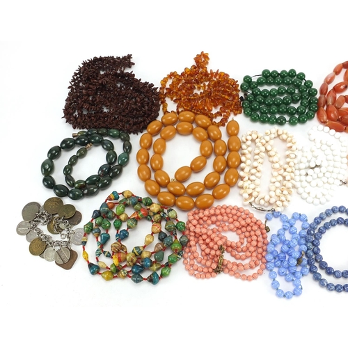 579 - Vintage costume jewellery necklaces and bracelets including amber coloured beads, carnelian, pips an... 