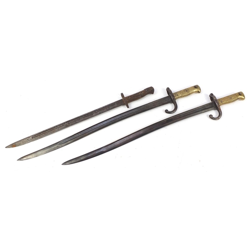 1396 - Three military interest long bayonets including two French examples