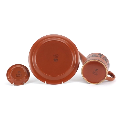 219 - Scottie Wilson for Royal Worcester brown glazed porcelain including teapot, plate and dish, each dec... 