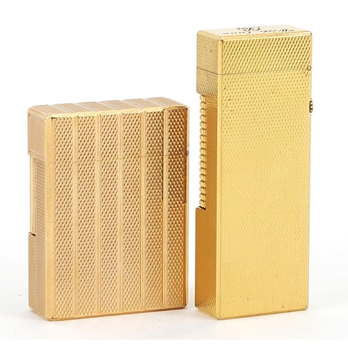 105 - Two gold plated engine turned pocket lighters comprising Dunhill and S J Dupont, the largest 6.5cm h... 