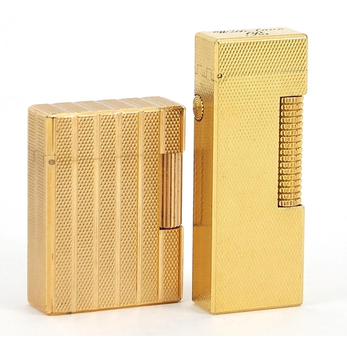 105 - Two gold plated engine turned pocket lighters comprising Dunhill and S J Dupont, the largest 6.5cm h... 