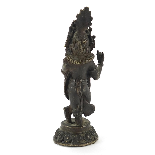 462 - Indian patinated bronze deity, 14.5cm high