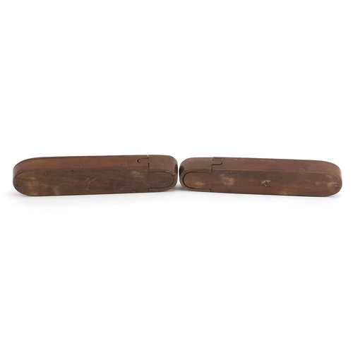 203 - Pair of Islamic wooden pen boxes carved with leaves and flowers, each 24.5cm in length