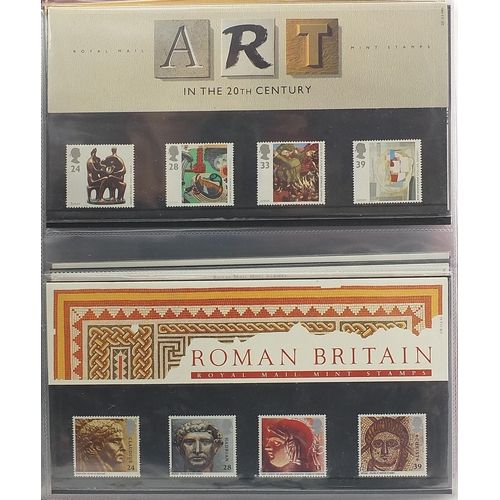 543 - Royal Mail presentation packs arranged in an album including Royal Mail High Value Definitive stamp