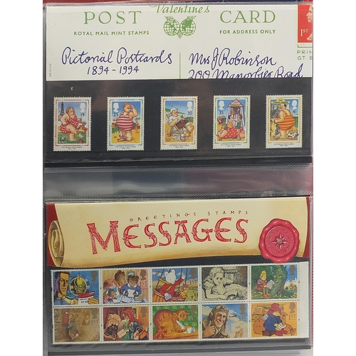 543 - Royal Mail presentation packs arranged in an album including Royal Mail High Value Definitive stamp