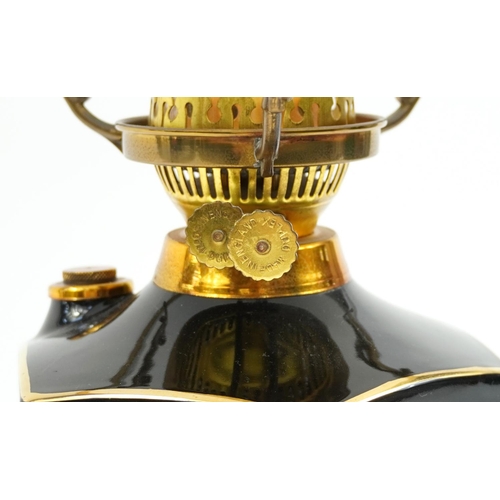 984 - Oil lamp with glass shade, 54cm high