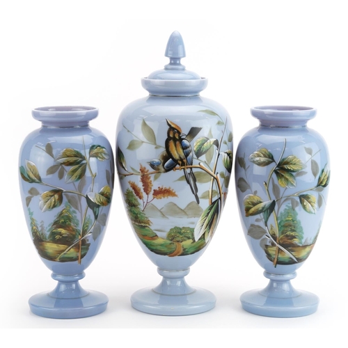 358A - 19th century blue opaline glass three piece vase garniture hand painted with birds on a branch, the ... 