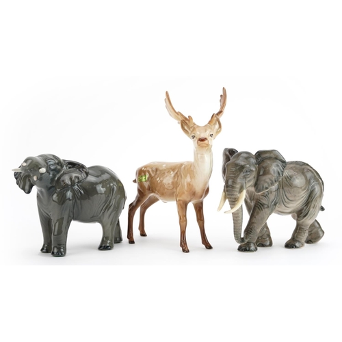 445 - Collectable china animals comprising Beswick elephant, Beswick stag and Goebel elephant, the largest... 