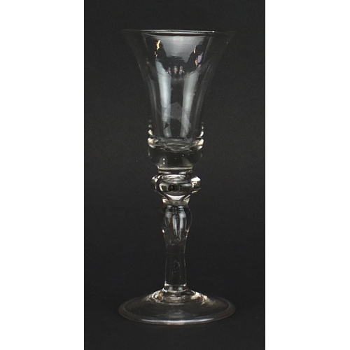 188 - 18th century wine glass with bell shaped bowl on folded foot, 15cm high