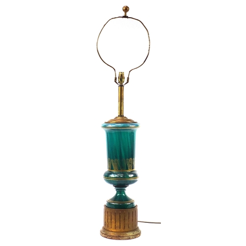 387 - Green glass table lamp with gilded decoration and column base, 107cm high