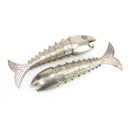 2122 - Two Peruvian style silver articulated fish with abalone eyes, each 19.5cm in length, total weight, 2... 