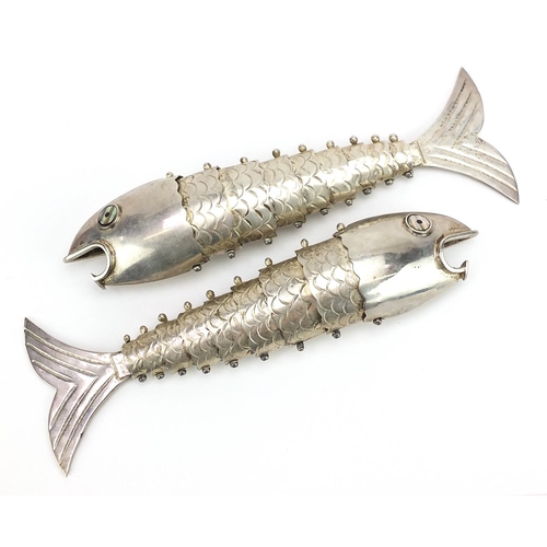 2122 - Two Peruvian style silver articulated fish with abalone eyes, each 19.5cm in length, total weight, 2... 