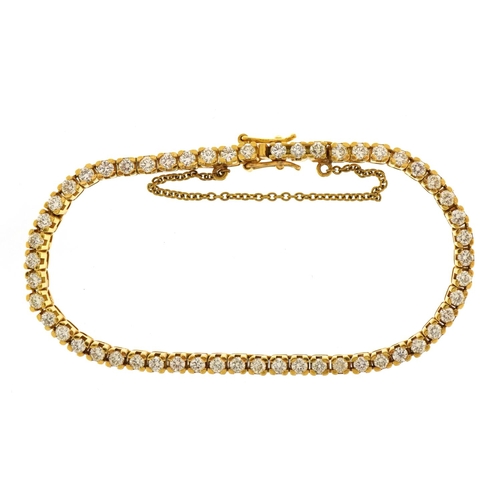 1403 - 18ct gold diamond line bracelet set with 53 diamonds, total diamond weight approximately 4ct,  the f... 