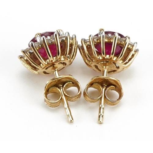 1409 - Pair of 9ct gold ruby and white sapphire stud earrings, 11mm in diameter, 2.8g