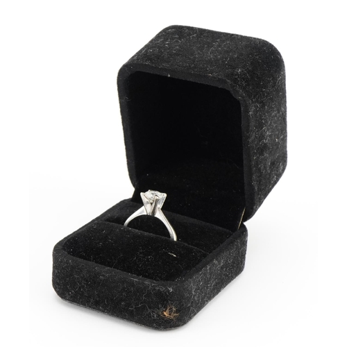 1412 - 14ct white gold diamond solitaire ring, the diamond 6.38mm in diameter, size N/O, 3.2g