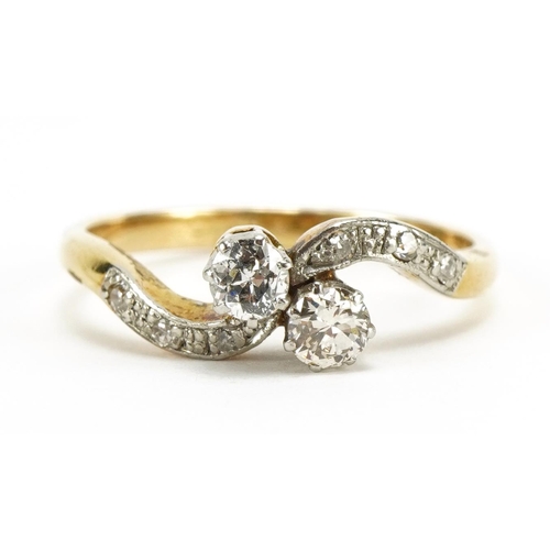 1420 - 18ct gold and platinum diamond crossover ring, size M/N, 2.8g