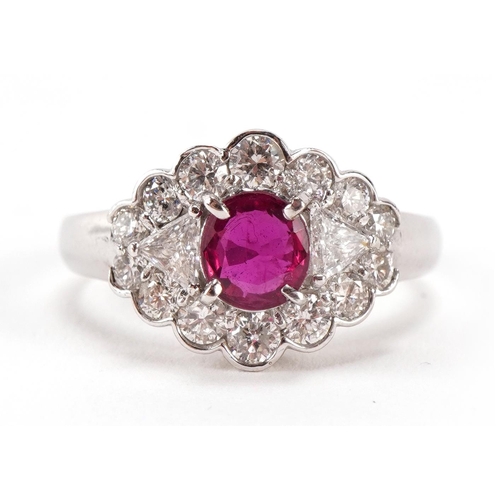 1418 - 14ct white gold ruby and diamond cluster ring, the ruby  5.70mm x 5.24mm, size N, 3.7g