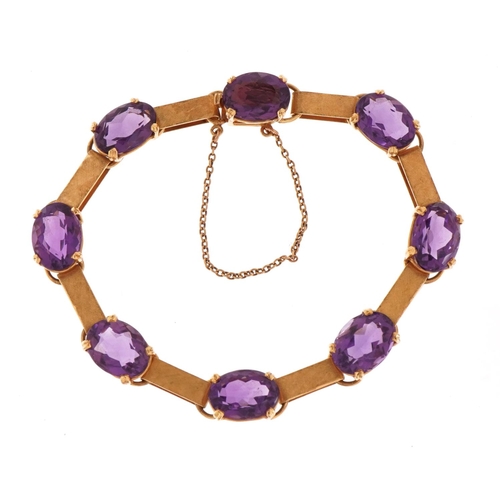 1414 - Unmarked gold amethyst bracelet, tests as 18ct gold, 20cm in length, 21.0g