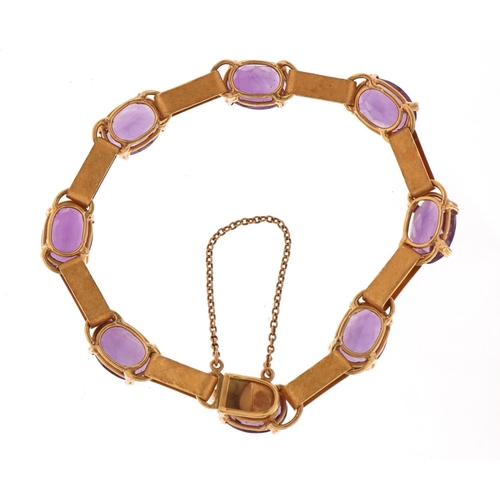 1414 - Unmarked gold amethyst bracelet, tests as 18ct gold, 20cm in length, 21.0g