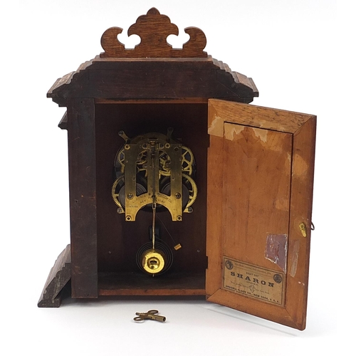 499 - American oak cased Ansonia mantle clock, Sharon Eight Day Strike label to the interior, 43cm high