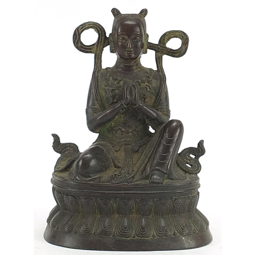 483 - Tibetan patinated bronze figure of Buddha, 16cm high