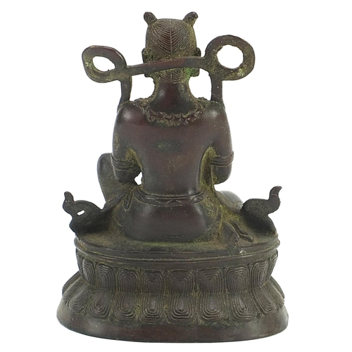 483 - Tibetan patinated bronze figure of Buddha, 16cm high