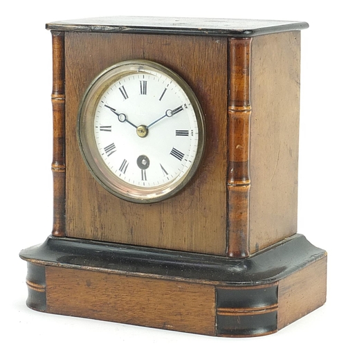 470 - Walnut cased striking mantle clock with enamelled dial, 20cm high