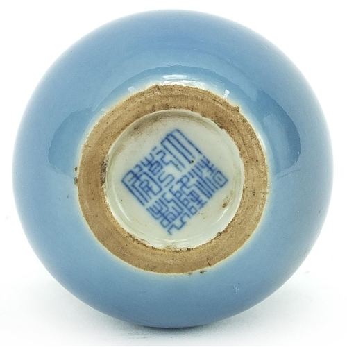 598 - Chinese porcelain double gourd vase having a blue glaze, character marks to the base, 11cm high