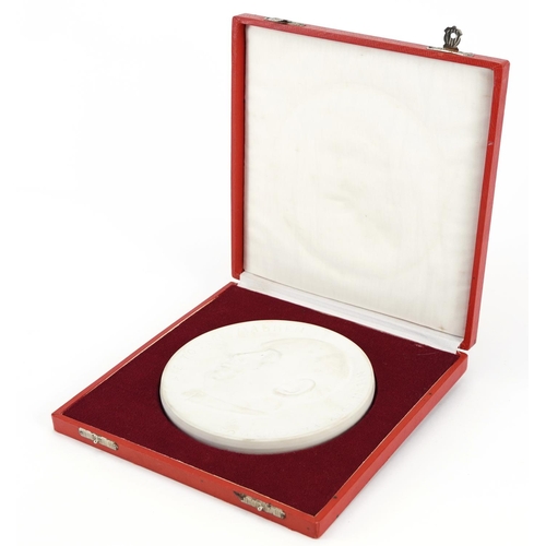 351 - Large Meissen parian plaque housed in a fitted silk lined case, the plaque 15cm in diameter