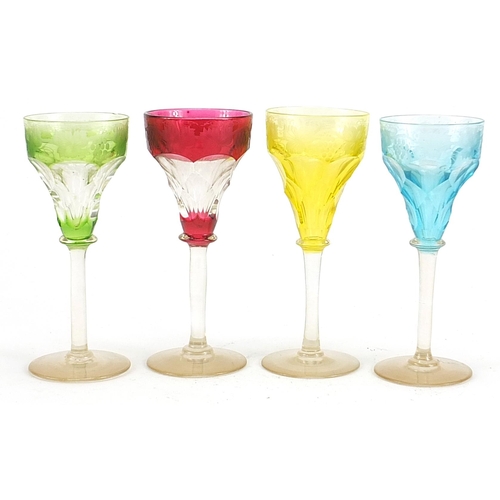 623 - Set of four Bohemian flashed cut glasses etched with leaves and berries, each 15cm high