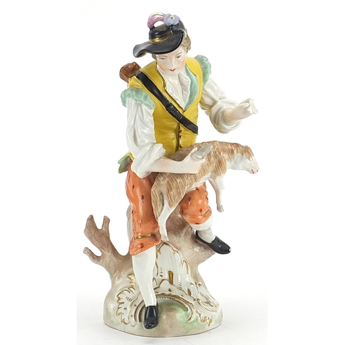 573 - Dresden, German porcelain figure of a shepherd with lamb, 21.5cm high