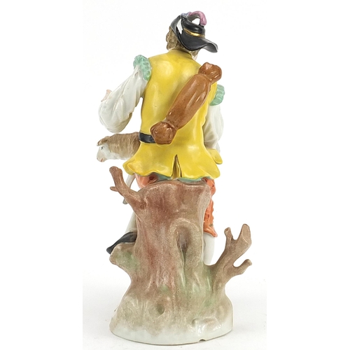 573 - Dresden, German porcelain figure of a shepherd with lamb, 21.5cm high