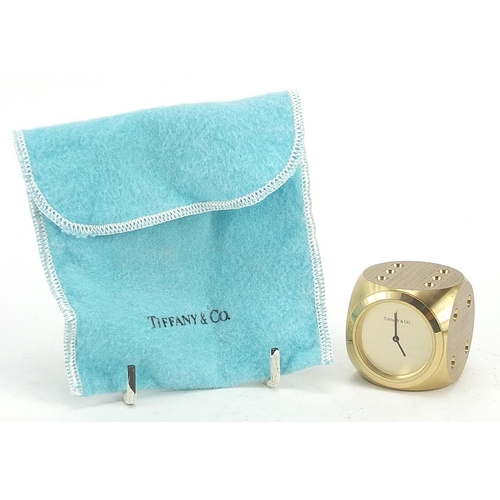 261 - Tiffany & Co, Las Vegas dice clock paperweight with cloth pouch, 4cm square