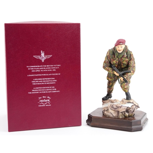 428 - Ashmore for Worcester porcelain commemorative military figure raised on a wooden plinth base, A Sold... 