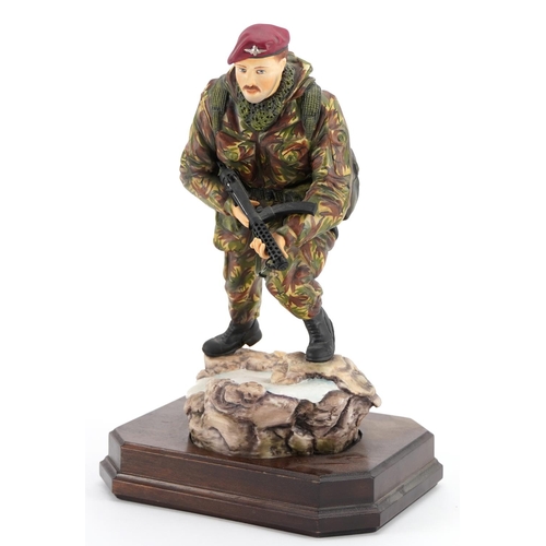 428 - Ashmore for Worcester porcelain commemorative military figure raised on a wooden plinth base, A Sold... 