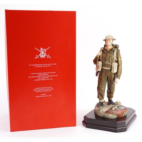 425 - Ashmore for Worcester porcelain commemorative military figure raised on a wooden plinth base, An Inf... 