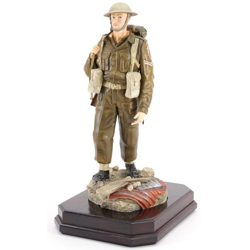 425 - Ashmore for Worcester porcelain commemorative military figure raised on a wooden plinth base, An Inf... 