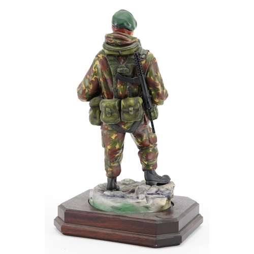 423 - Ashmore for Worcester porcelain commemorative military figure raised on a wooden plinth base, Royal ... 