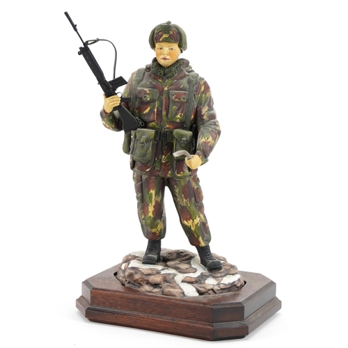 424 - Ashmore for Worcester porcelain commemorative military figure raised on a wooden plinth base, A Sold... 