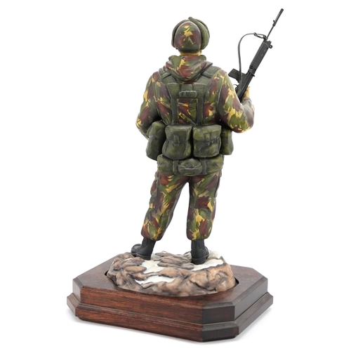 424 - Ashmore for Worcester porcelain commemorative military figure raised on a wooden plinth base, A Sold... 