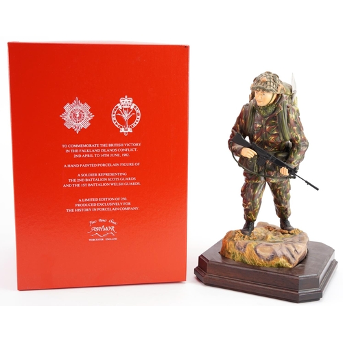 422 - Ashmore for Worcester porcelain commemorative military figure raised on a wooden plinth base, Soldie... 